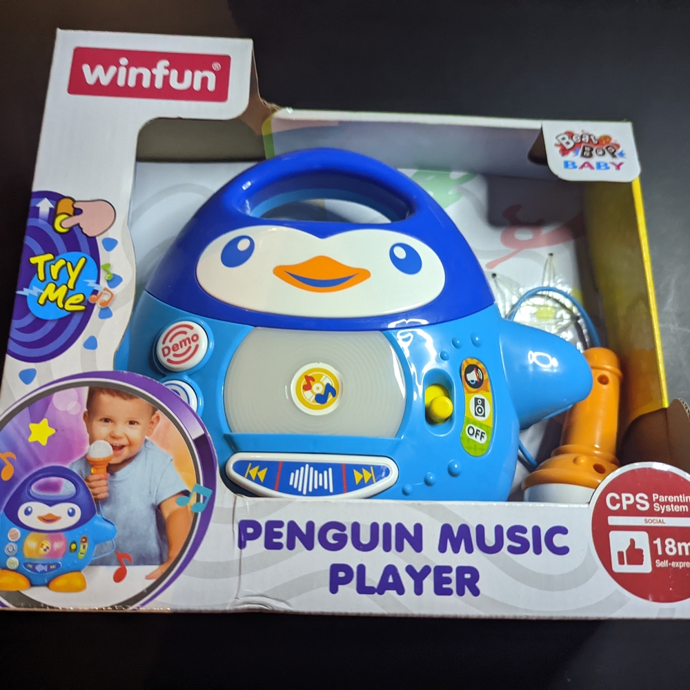 Blue and Orange Learning Toy Penguin Music Player